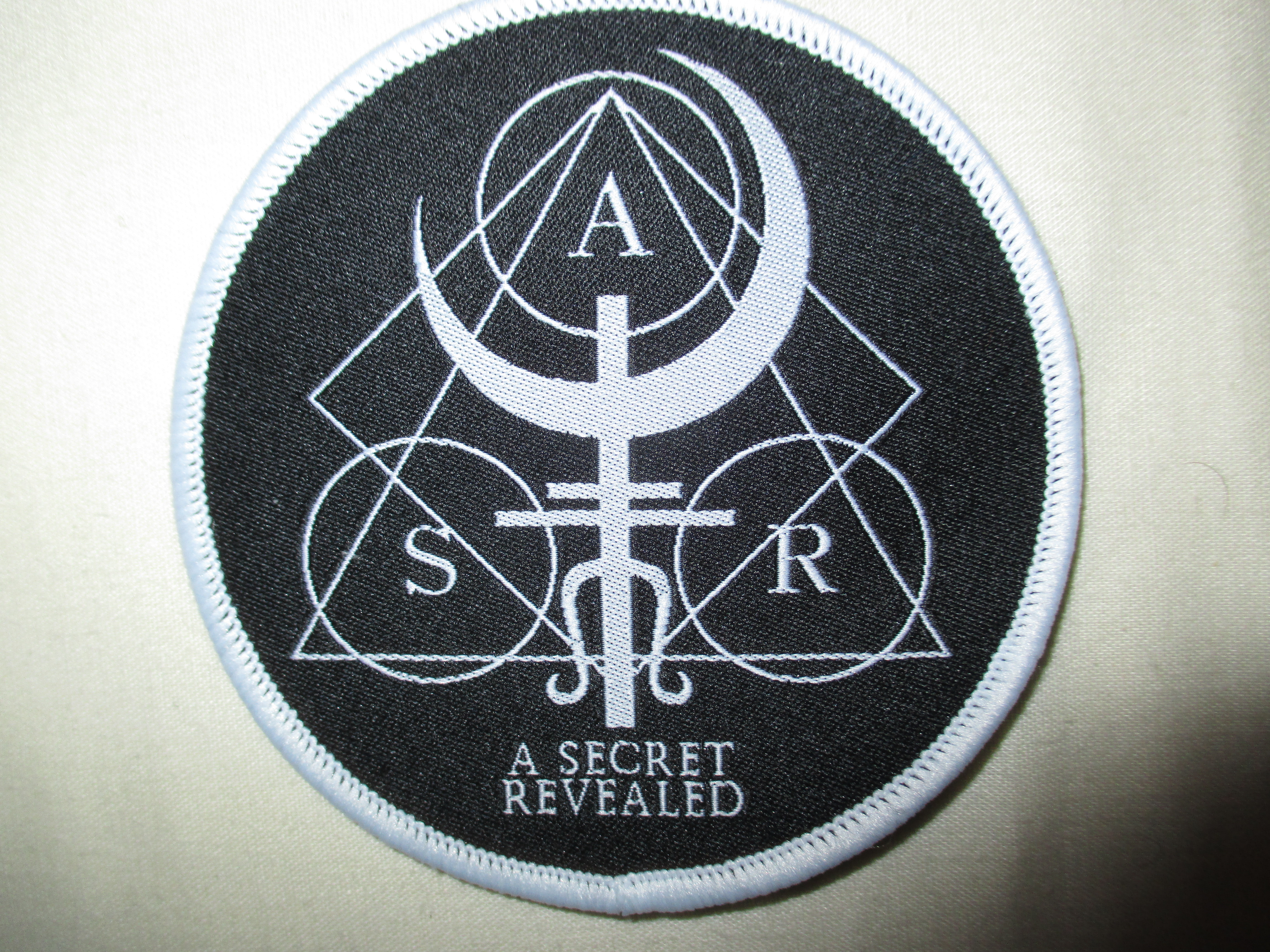 A Secret Revealed - Logo Patch